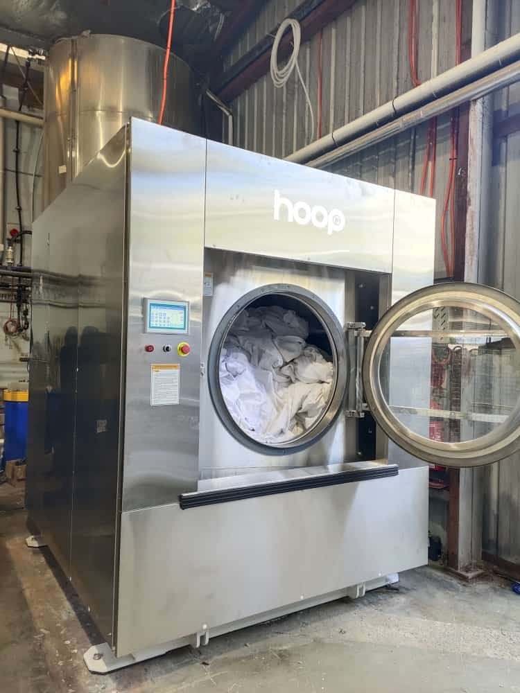 130kg industrial washer extractor at a commercial laundry facility